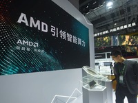 Visitors visit the booth of AMD at the 6th CIIE in Shanghai, China, on November 6, 2023. (