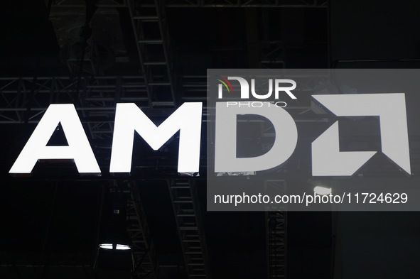 Visitors visit the booth of AMD at the 6th CIIE in Shanghai, China, on November 6, 2023. 