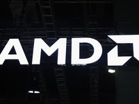 Visitors visit the booth of AMD at the 6th CIIE in Shanghai, China, on November 6, 2023. (