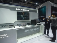 Visitors visit the booth of AMD at the 6th CIIE in Shanghai, China, on November 6, 2023. (