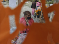 Women sell Cempasuchil flowers in the Tlahuac municipality in Mexico City, Mexico, on October 30, 2024, for the Day of the Dead on November...