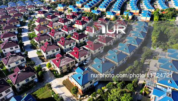 An aerial photo taken in Chengdong town, Hai'an City, Jiangsu province, China, on October 31, 2024, shows the residential area of farmers. 