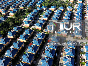 An aerial photo taken in Chengdong town, Hai'an City, Jiangsu province, China, on October 31, 2024, shows the residential area of farmers. (