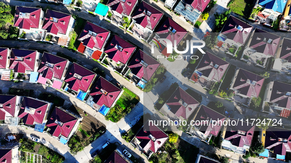 An aerial photo taken in Chengdong town, Hai'an City, Jiangsu province, China, on October 31, 2024, shows the residential area of farmers. 