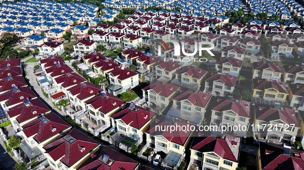 An aerial photo taken in Chengdong town, Hai'an City, Jiangsu province, China, on October 31, 2024, shows the residential area of farmers. 