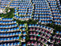 An aerial photo taken in Chengdong town, Hai'an City, Jiangsu province, China, on October 31, 2024, shows the residential area of farmers. (