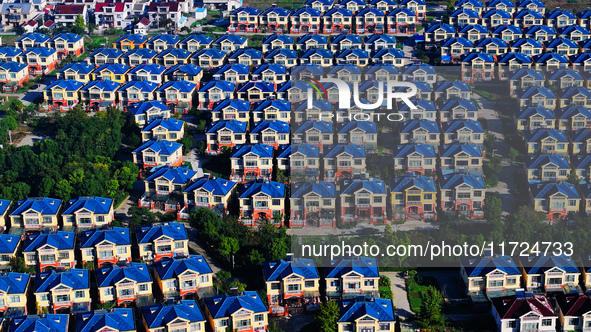 An aerial photo taken in Chengdong town, Hai'an City, Jiangsu province, China, on October 31, 2024, shows the residential area of farmers. 