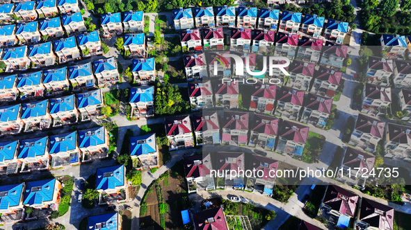 An aerial photo taken in Chengdong town, Hai'an City, Jiangsu province, China, on October 31, 2024, shows the residential area of farmers. 