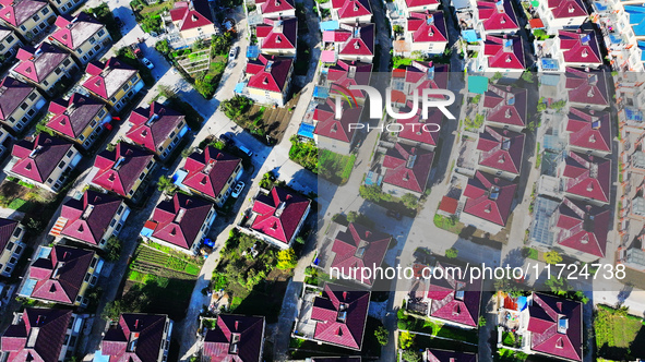 An aerial photo taken in Chengdong town, Hai'an City, Jiangsu province, China, on October 31, 2024, shows the residential area of farmers. 