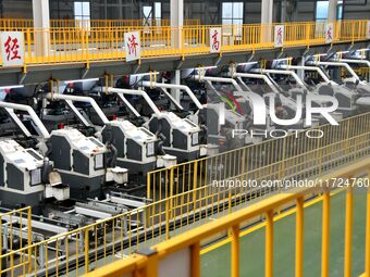 A worker produces drill tail wire for export overseas in a digital intelligent production workshop at a hardware manufacturing company in Ha...