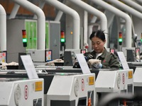 A worker works in a digital intelligent production workshop at a hardware manufacturing company in Handan, China, on October 30, 2024. (