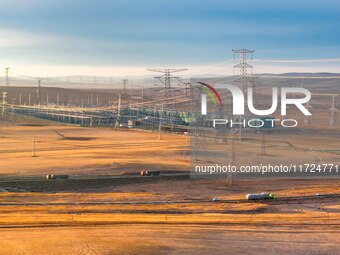 An aerial photo shows the Zhangbei-Shengli 1000kV UHV AC project of Shengli Substation in Xilingol League, Inner Mongolia, China, on October...