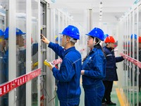 Operation and maintenance personnel work at the Shengli Substation of the Zhangbei-Shengli 1000kV UHV AC project in Xilingol League, Inner M...