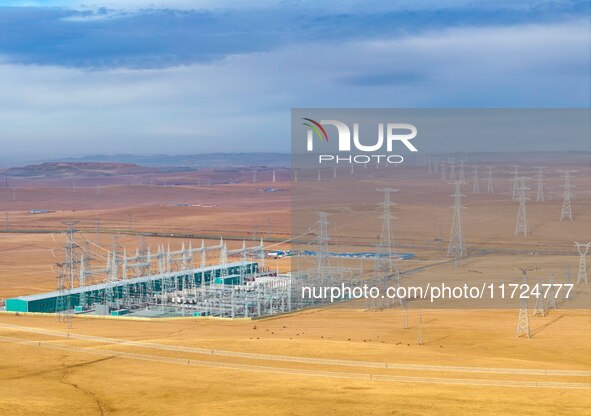 An aerial photo shows the Zhangbei-Shengli 1000kV UHV AC project of Shengli Substation in Xilingol League, Inner Mongolia, China, on October...