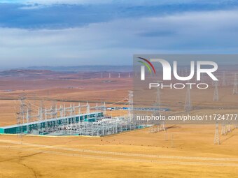 An aerial photo shows the Zhangbei-Shengli 1000kV UHV AC project of Shengli Substation in Xilingol League, Inner Mongolia, China, on October...