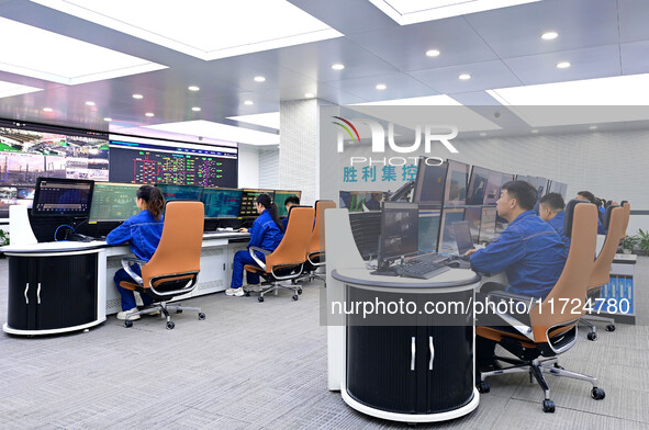 Operation and maintenance personnel work in the centralized control room of Shengli Substation of the Zhangbei-Shengli 1000kV UHV AC project...