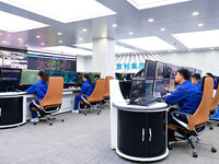 Operation and maintenance personnel work in the centralized control room of Shengli Substation of the Zhangbei-Shengli 1000kV UHV AC project...