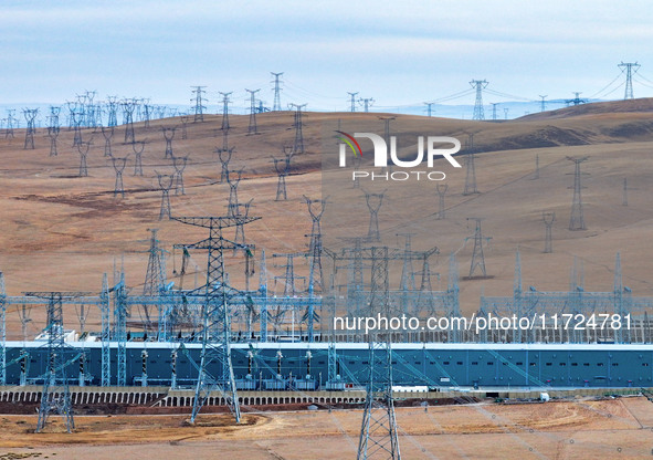 An aerial photo shows the Zhangbei-Shengli 1000kV UHV AC project of Shengli Substation in Xilingol League, Inner Mongolia, China, on October...