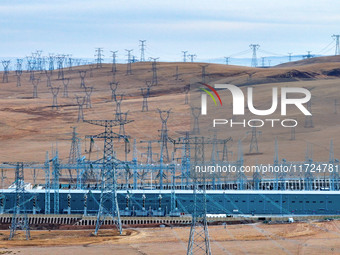 An aerial photo shows the Zhangbei-Shengli 1000kV UHV AC project of Shengli Substation in Xilingol League, Inner Mongolia, China, on October...