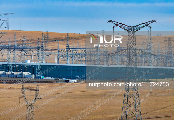 An aerial photo shows the Zhangbei-Shengli 1000kV UHV AC project of Shengli Substation in Xilingol League, Inner Mongolia, China, on October...