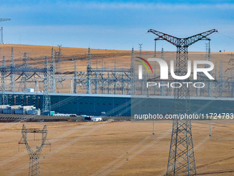 An aerial photo shows the Zhangbei-Shengli 1000kV UHV AC project of Shengli Substation in Xilingol League, Inner Mongolia, China, on October...