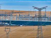 An aerial photo shows the Zhangbei-Shengli 1000kV UHV AC project of Shengli Substation in Xilingol League, Inner Mongolia, China, on October...