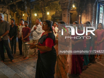 Hindu devotees pray and offer for Diwali at the Sri Ponnambala Vaneswarar Hindu temple in Colombo, Sri Lanka, on October 31, 2024. Diwali, o...