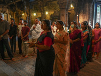 Hindu devotees pray and offer for Diwali at the Sri Ponnambala Vaneswarar Hindu temple in Colombo, Sri Lanka, on October 31, 2024. Diwali, o...