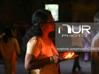 A Hindu devotee offers a prayer for Diwali at the Sri Ponnambala Vaneswarar Hindu temple in Colombo, Sri Lanka, on October 31, 2024. Diwali,...