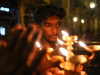 A Hindu devotee offers a prayer for Diwali at the Sri Ponnambala Vaneswarar Hindu temple in Colombo, Sri Lanka, on October 31, 2024. Diwali,...