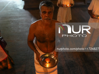 A Hindu devotee offers a prayer for Diwali at the Sri Ponnambala Vaneswarar Hindu temple in Colombo, Sri Lanka, on October 31, 2024. Diwali,...