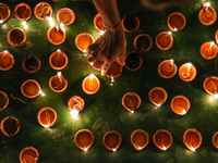 Hindu devotees light oil lamps to celebrate Diwali at the Sri Ponnambala Vaneswarar Hindu temple in Colombo, Sri Lanka, on October 31, 2024....