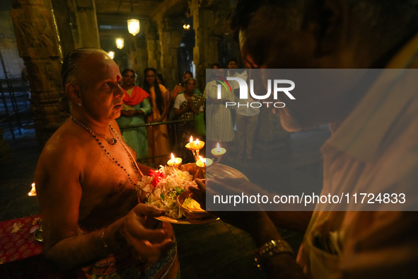 Hindu devotees pray and offer for Diwali at the Sri Ponnambala Vaneswarar Hindu temple in Colombo, Sri Lanka, on October 31, 2024. Diwali, o...