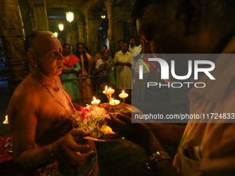 Hindu devotees pray and offer for Diwali at the Sri Ponnambala Vaneswarar Hindu temple in Colombo, Sri Lanka, on October 31, 2024. Diwali, o...