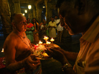 Hindu devotees pray and offer for Diwali at the Sri Ponnambala Vaneswarar Hindu temple in Colombo, Sri Lanka, on October 31, 2024. Diwali, o...