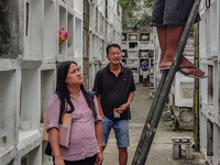 Filipinos visit the graves of their loved ones in Rizal, Philippines, on October 31, 2024. Undas, a unique occasion observed by Filipinos, d...