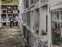 Filipinos visit the graves of their loved ones in Rizal, Philippines, on October 31, 2024. Undas, a unique occasion observed by Filipinos, d...