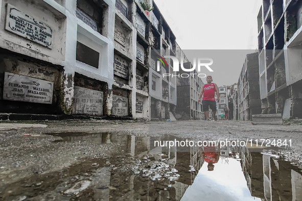 Filipinos visit the graves of their loved ones in Rizal, Philippines, on October 31, 2024. Undas, a unique occasion observed by Filipinos, d...