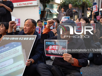 Around 20 members of the Korean University Students' Progressive Union and citizens protest at the People Power Party's central office in Ye...