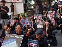 Around 20 members of the Korean University Students' Progressive Union and citizens protest at the People Power Party's central office in Ye...