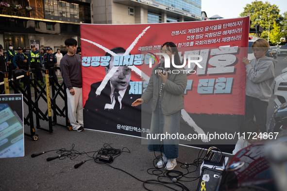 Around 20 members of the Korean University Students' Progressive Union and citizens protest at the People Power Party's central office in Ye...