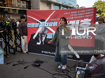 Around 20 members of the Korean University Students' Progressive Union and citizens protest at the People Power Party's central office in Ye...