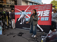 Around 20 members of the Korean University Students' Progressive Union and citizens protest at the People Power Party's central office in Ye...