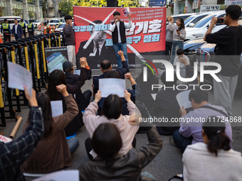 Around 20 members of the Korean University Students' Progressive Union and citizens protest at the People Power Party's central office in Ye...