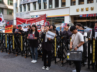 Around 20 members of the Korean University Students' Progressive Union and citizens protest at the People Power Party's central office in Ye...