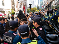 Around 20 members of the Korean University Students' Progressive Union and citizens protest at the People Power Party's central office in Ye...