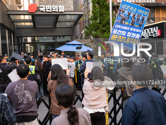 Around 20 members of the Korean University Students' Progressive Union and citizens protest at the People Power Party's central office in Ye...