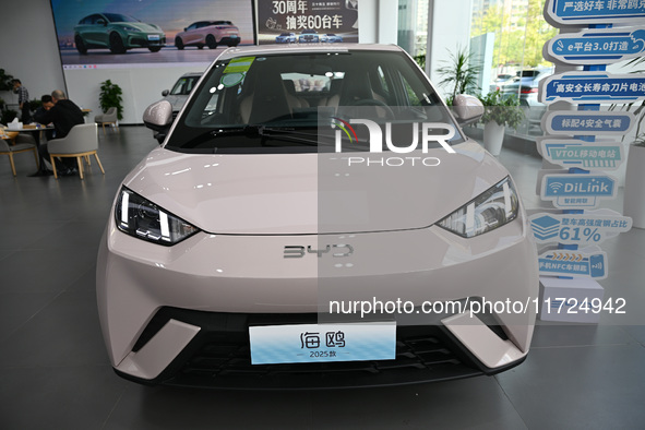 A car is displayed at a BYD 4S shop in Nanjing, China, on October 31, 2024. On October 31, 2024, BYD announces that its operating income in...