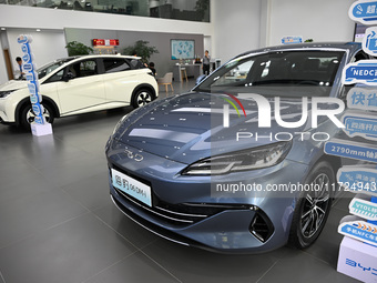 A car is displayed at a BYD 4S shop in Nanjing, China, on October 31, 2024. On October 31, 2024, BYD announces that its operating income in...