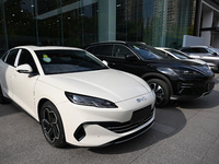 A car is displayed at a BYD 4S shop in Nanjing, China, on October 31, 2024. On October 31, 2024, BYD announces that its operating income in...